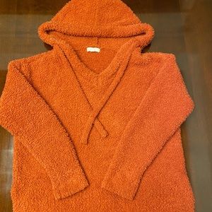 Fluffy sweater with hood